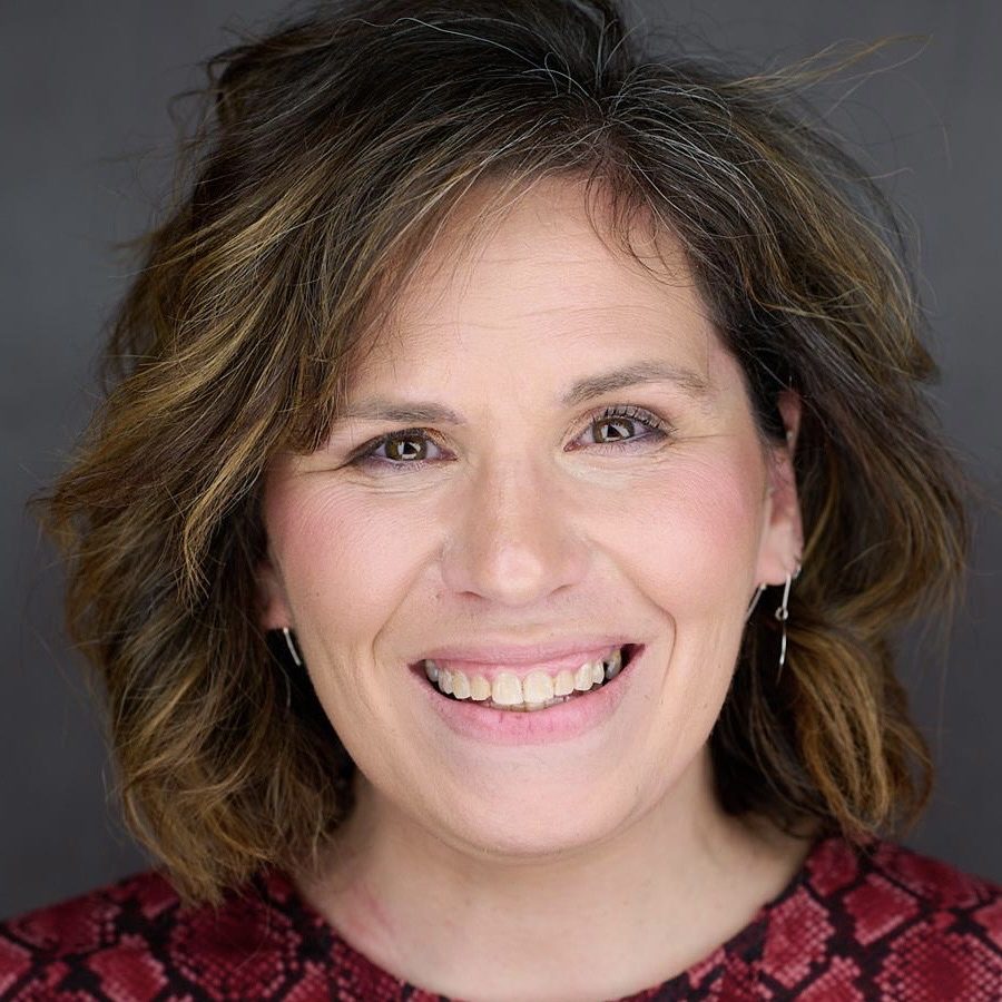 Marcy, Las Vegas portrait and boudoir photographer, smiling headshot
